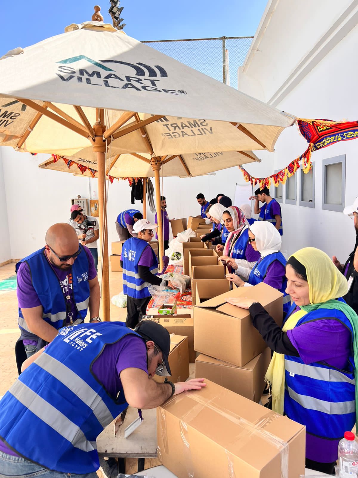 FedEx Ramadan Food Packing Egypt - وكالة عكاظ الاخبارية