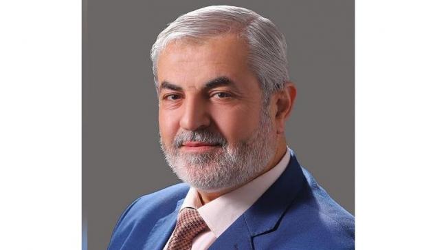 الدكتور علي منعم محمد القضاة يحذر يحيى الوزان بالعراق من استخدام صور له